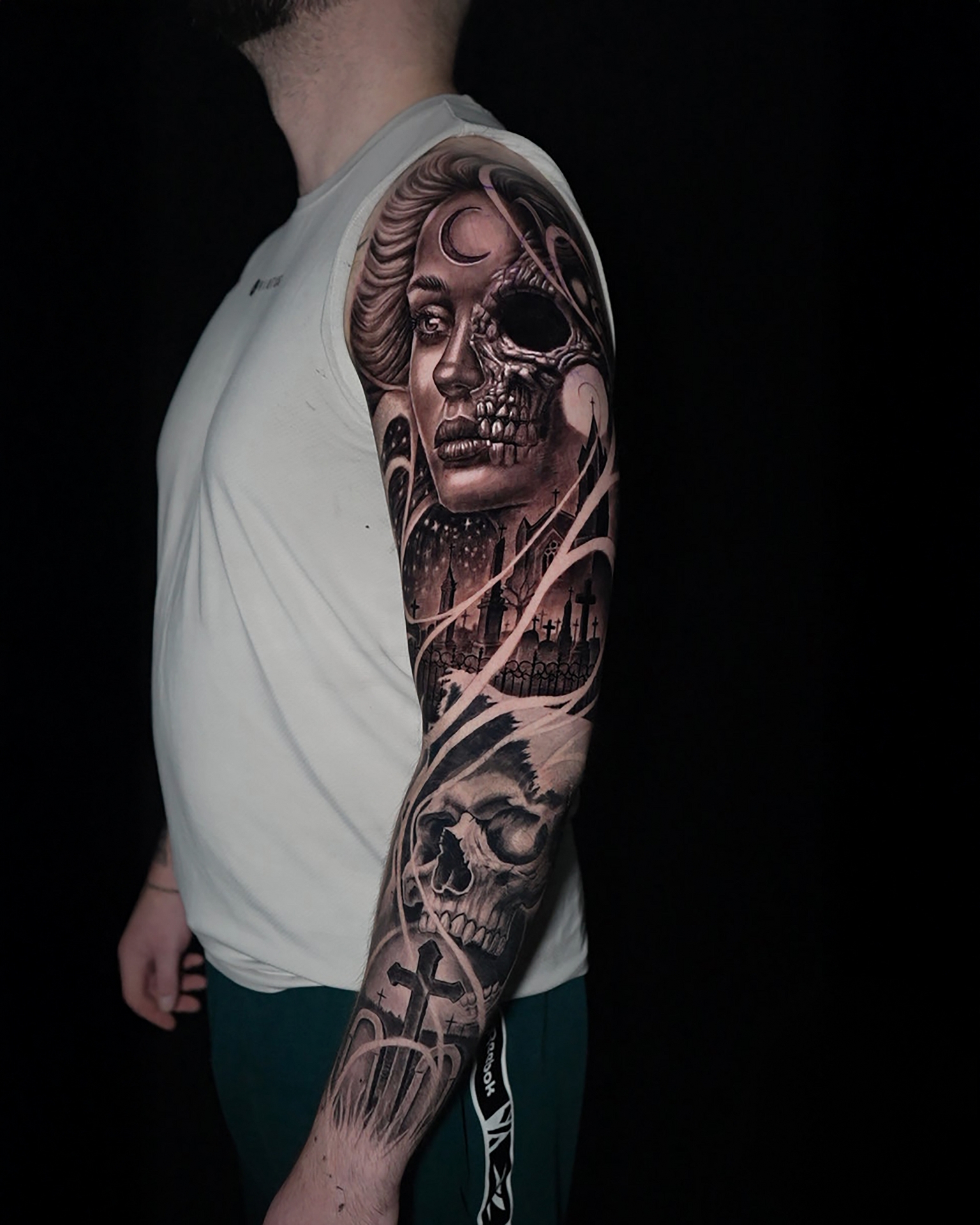 Full sleeve in black and grey realism by Raza Tattoo in Aarhus 