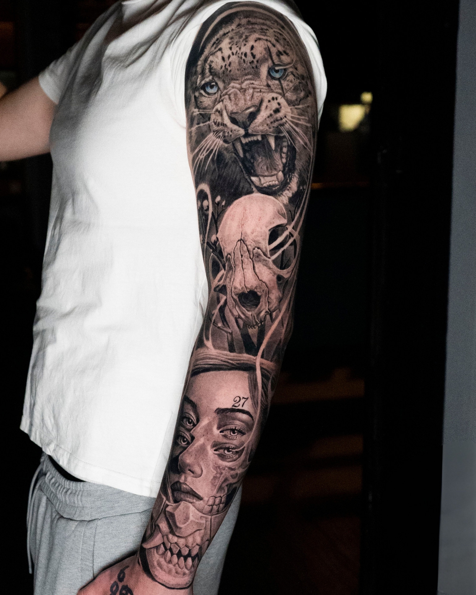 Full sleeve in black and grey realism by Raza Tattoo in Aarhus 