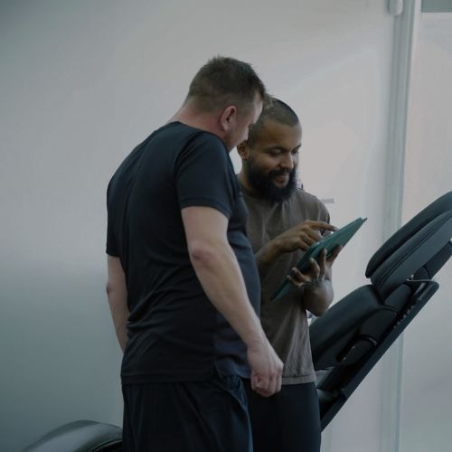 Raza having consultation with client in Aarhus 