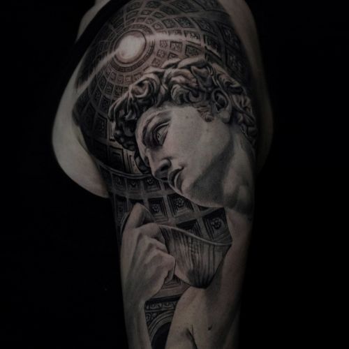 Half sleeve in black and grey realism by Raza Tattoo Aarhus