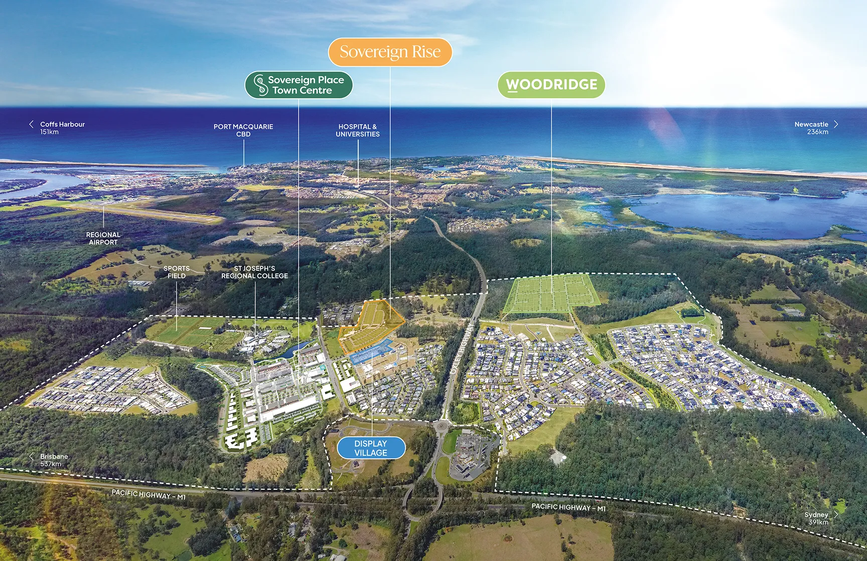 Aerial view of a suburban area with marked zones, roads, parks, and nearby coastlines.