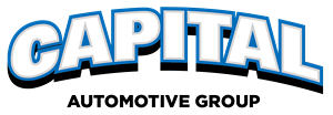 The word CAPITAL in white block letters with blue outlines on a black background.