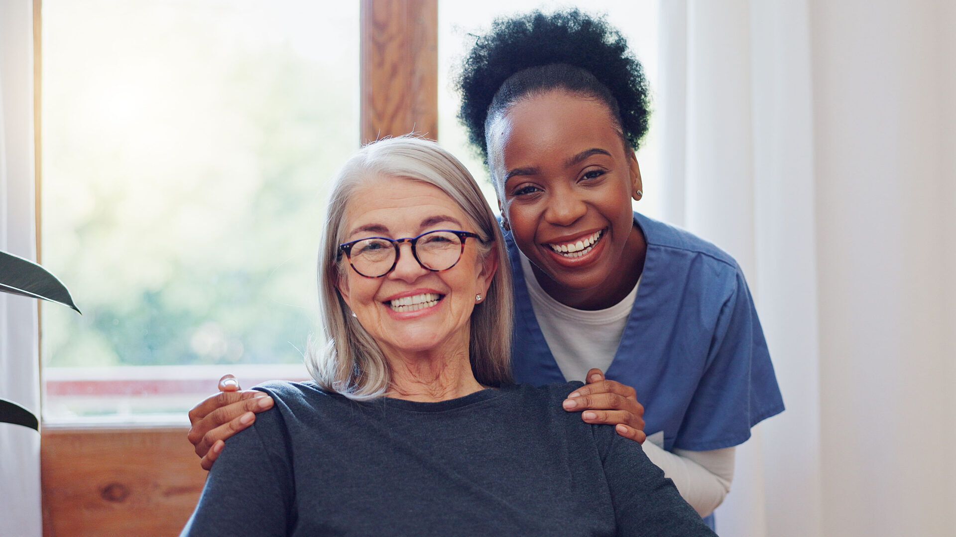 Healthcare team members talking in a care facility