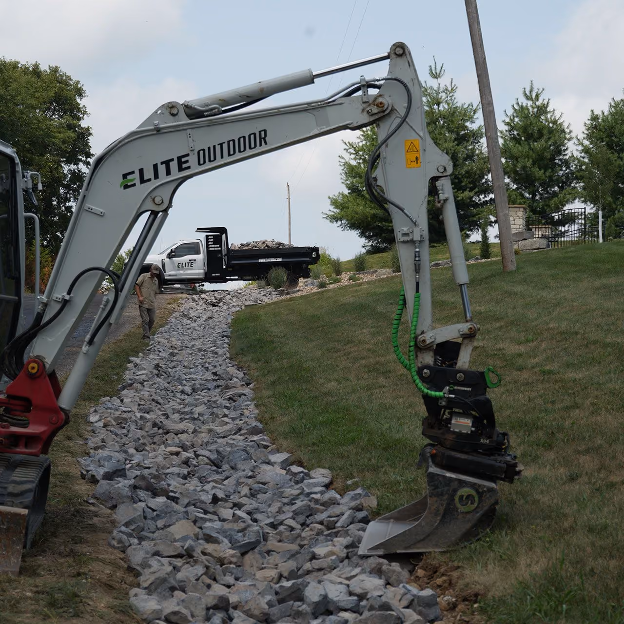 Underground downspout drainage system for residential property
t