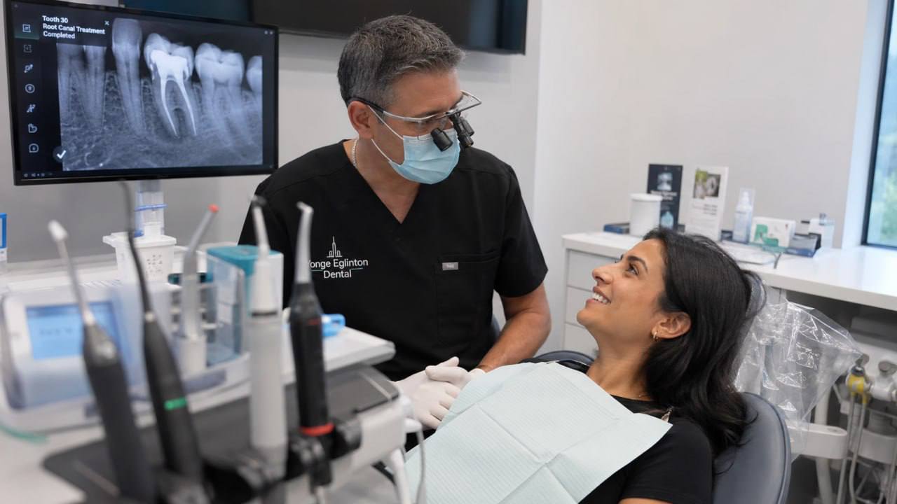 Dentist discussing completed root canal treatment