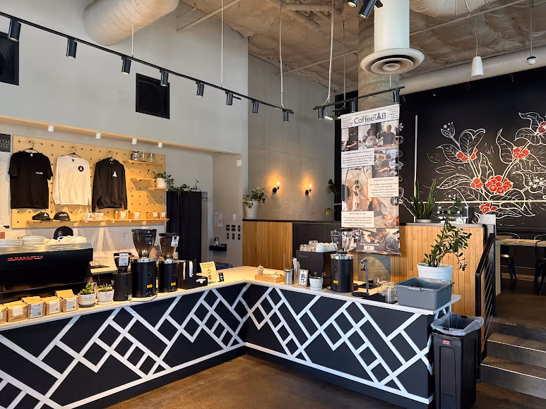 A coffee shop with a black and white checkered floor.