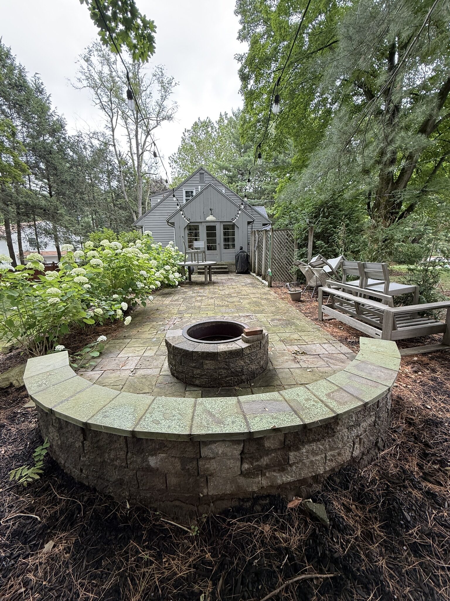 Clean paver patio with a firepit in Middlesex County, CT