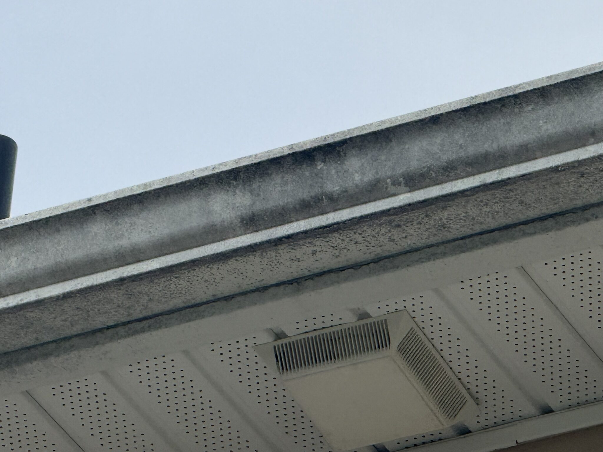 Close-up of clean gutters, soffit, and fascia along a roofline