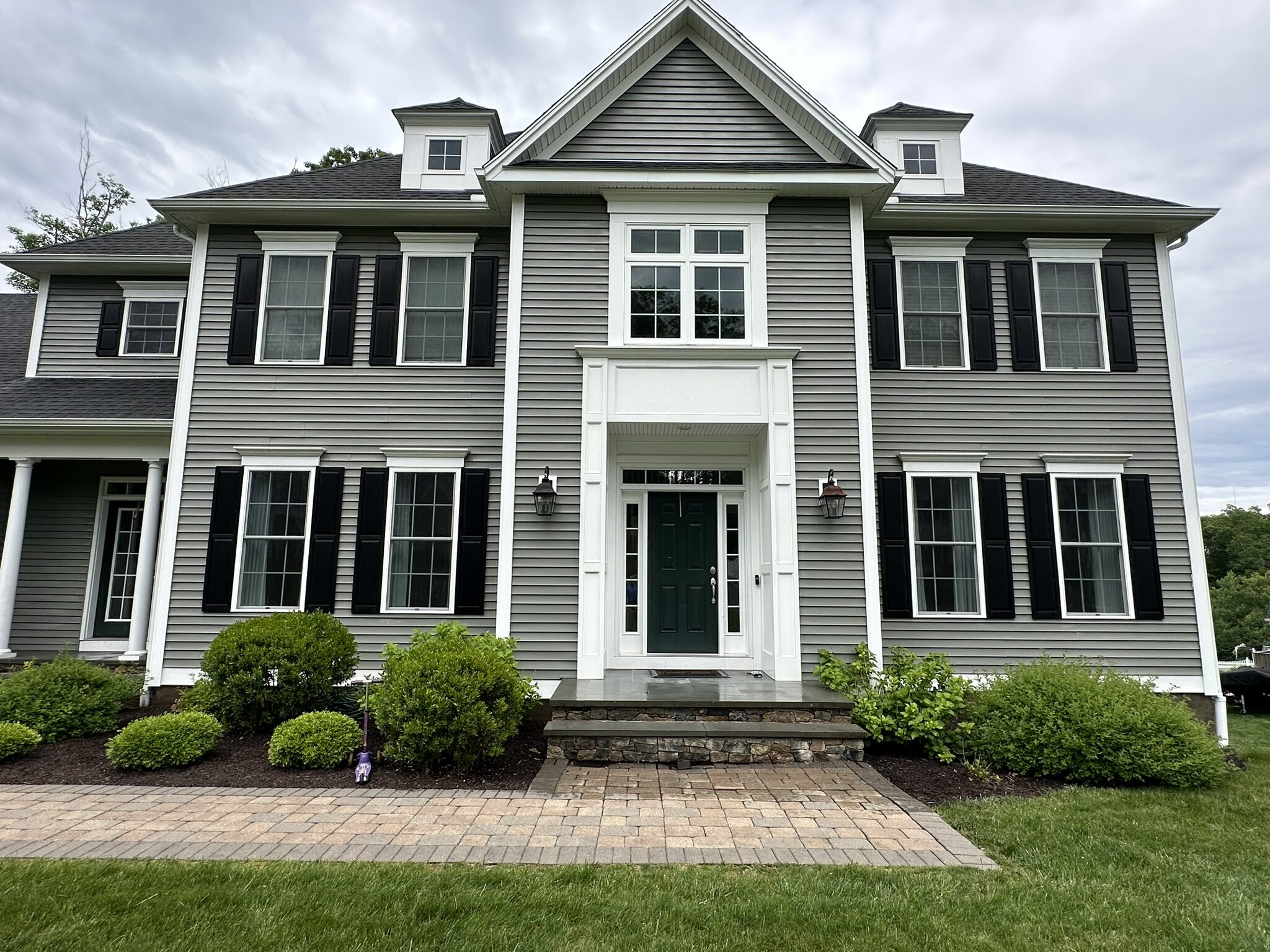 White colonial with columns in West Hartford, CT