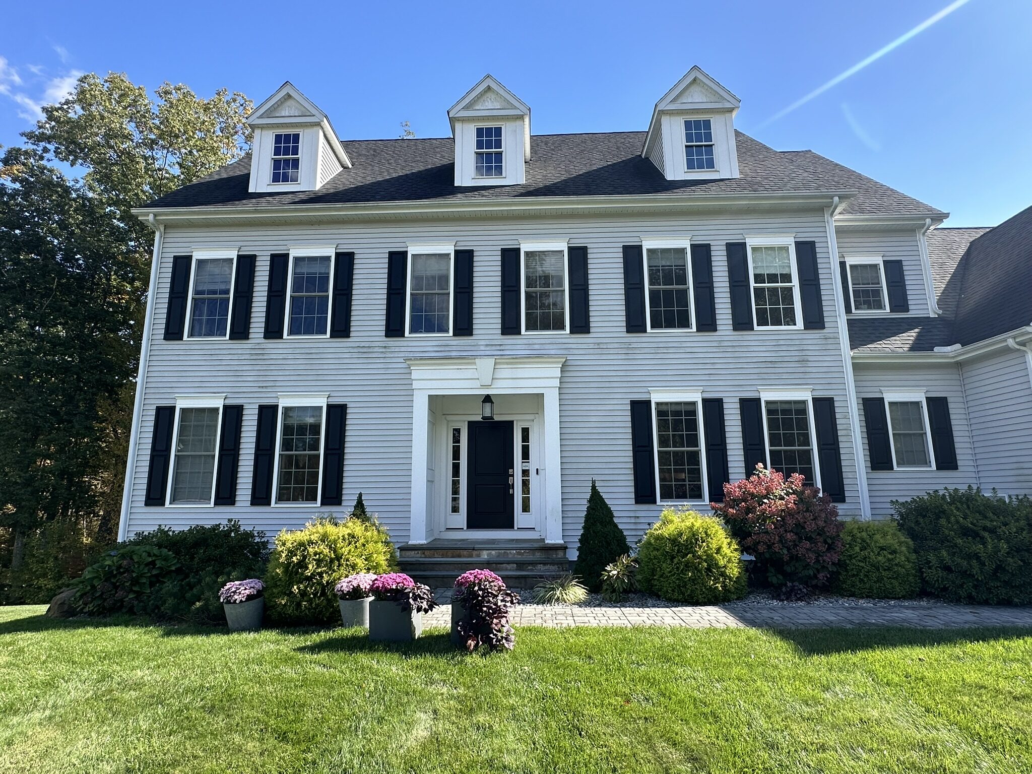 Black colonial with white trim in Wethersfield, CT