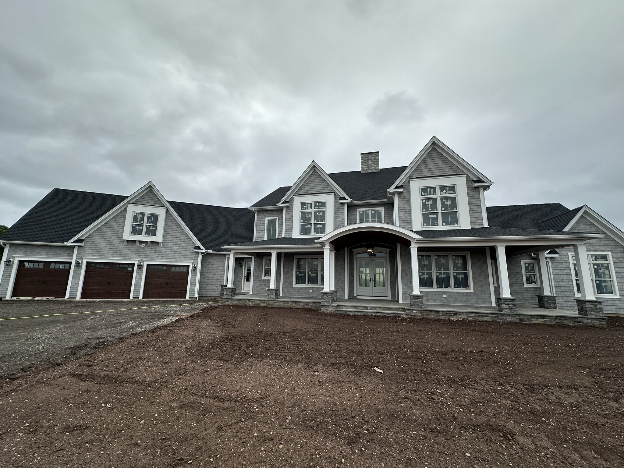 Gray shingle estate home in Simsbury, CT