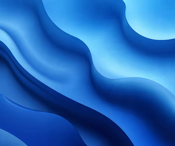 Abstract flowing blue shapes with gradient shading creating a smooth wave-like pattern.