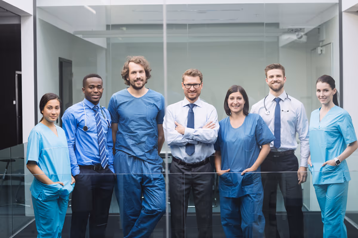 Team doctors standing corridor