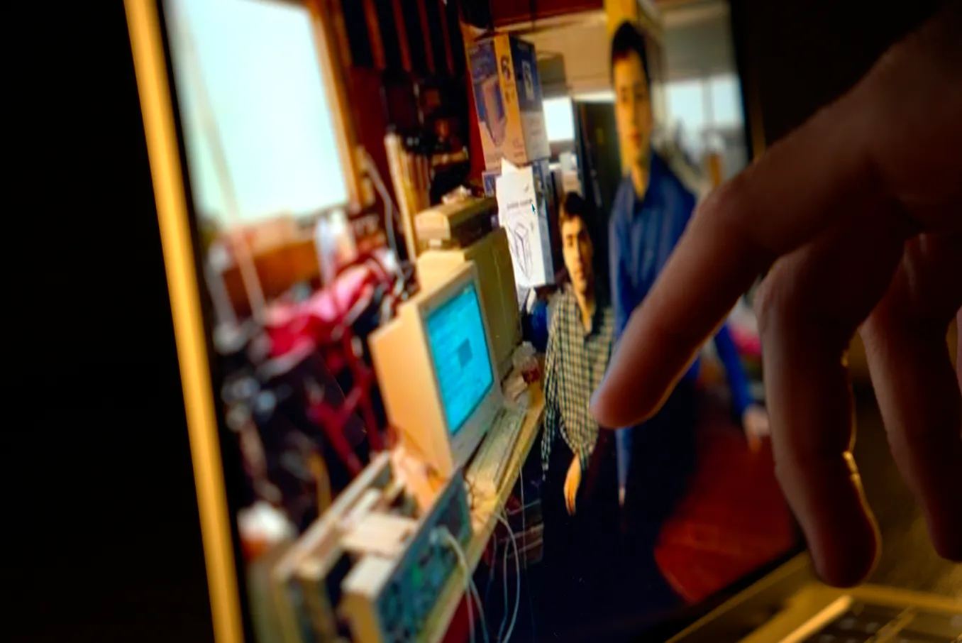 Man assessing online pictures on google.