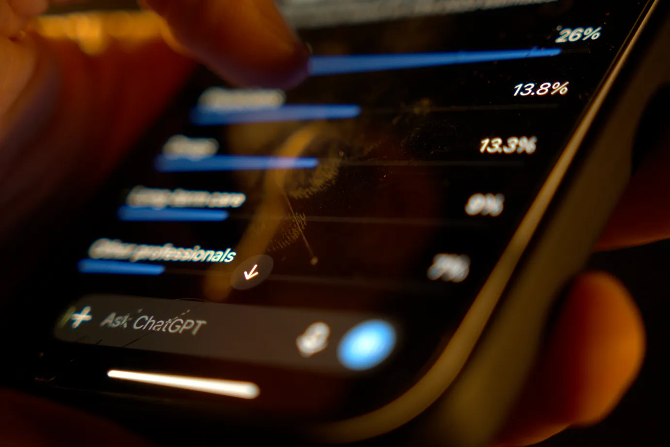 Man reading analytics provided by an AI assistant on his phone.