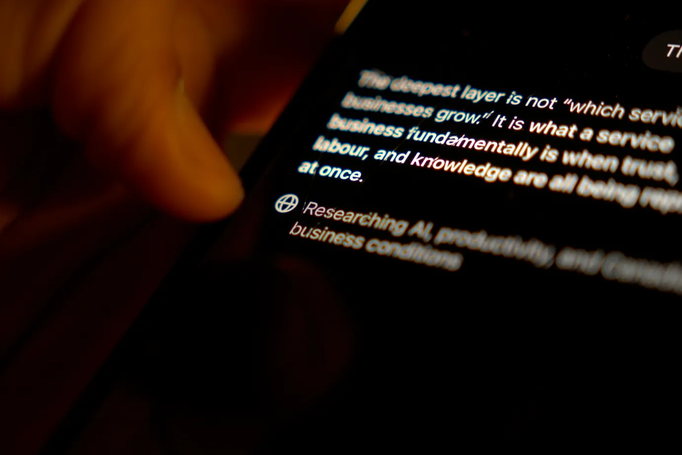 AI LLM thinking following user prompt on a phone.