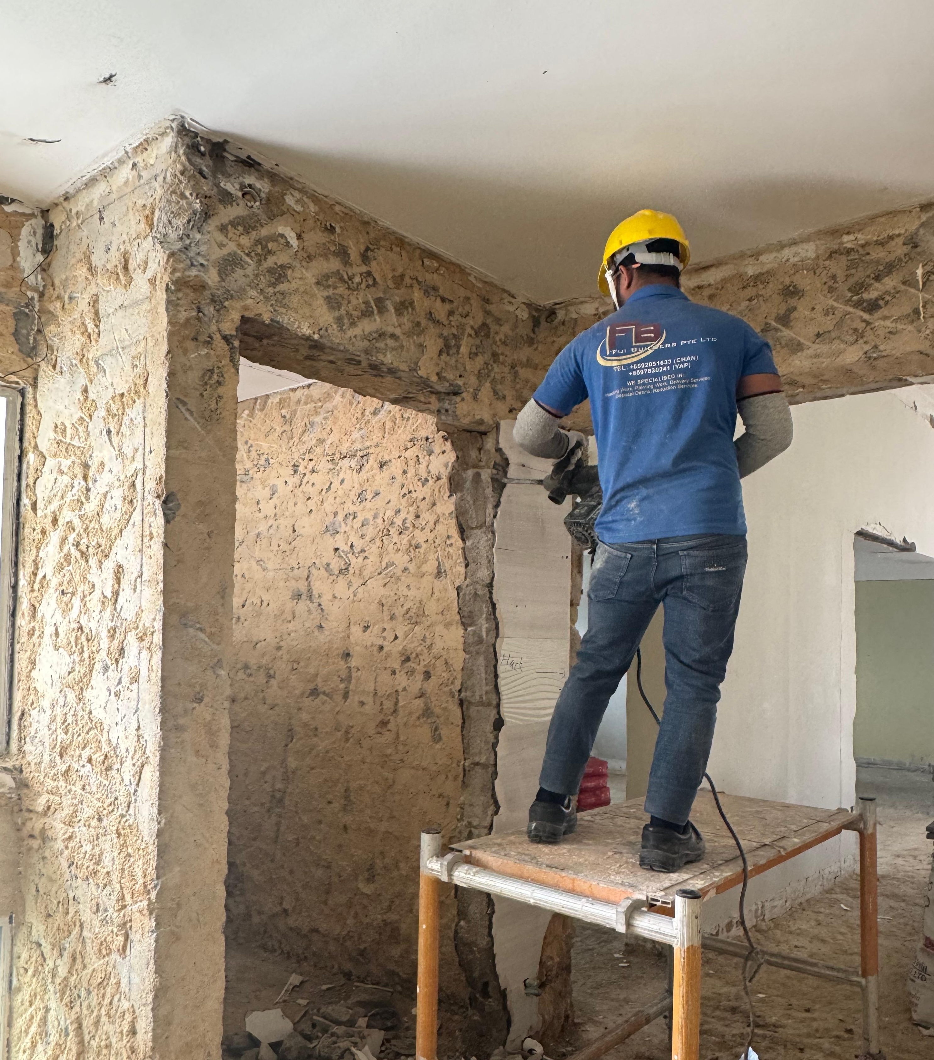 Fui Builders demolition crew on site in Singapore