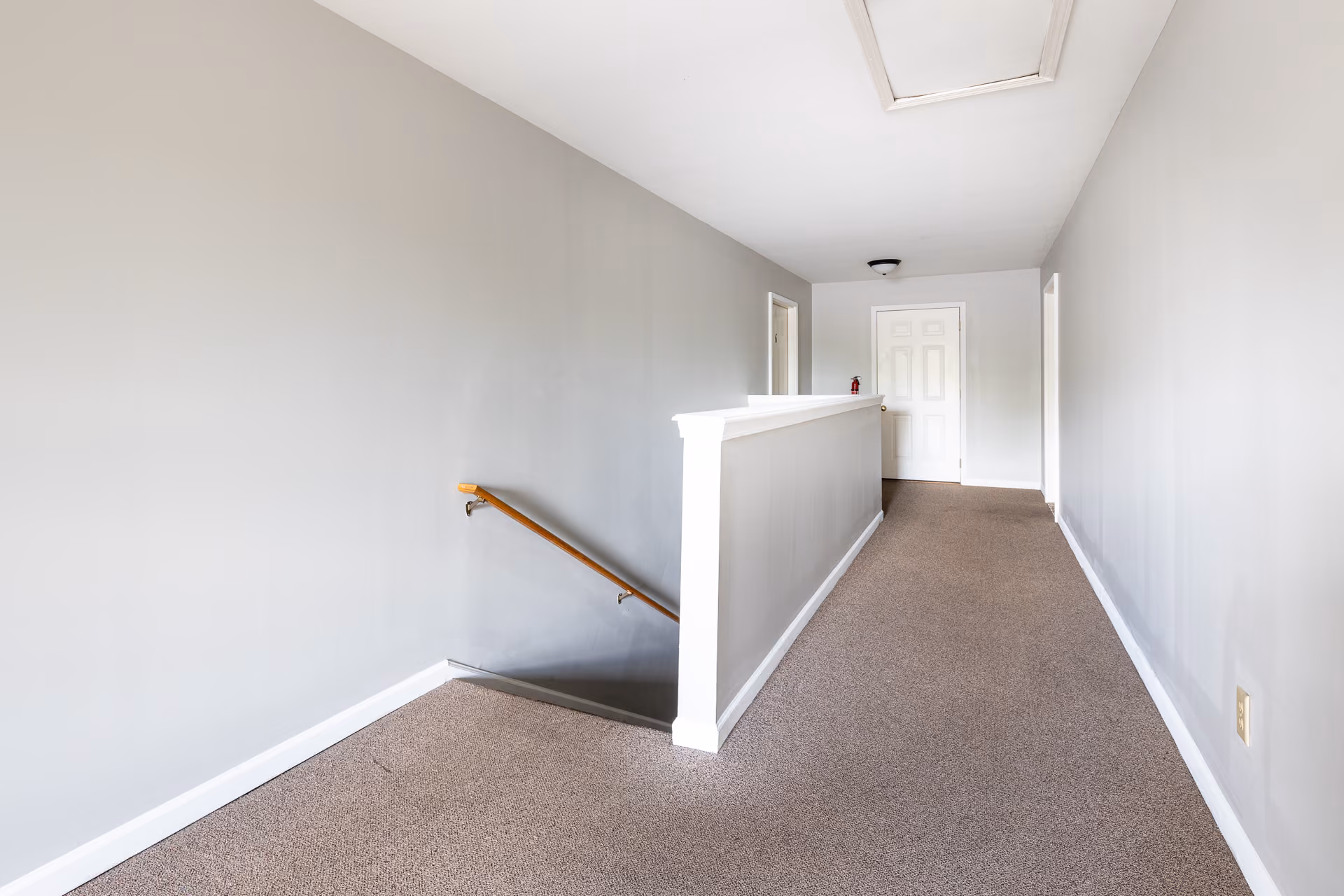 Stairs and hallway to bedroom