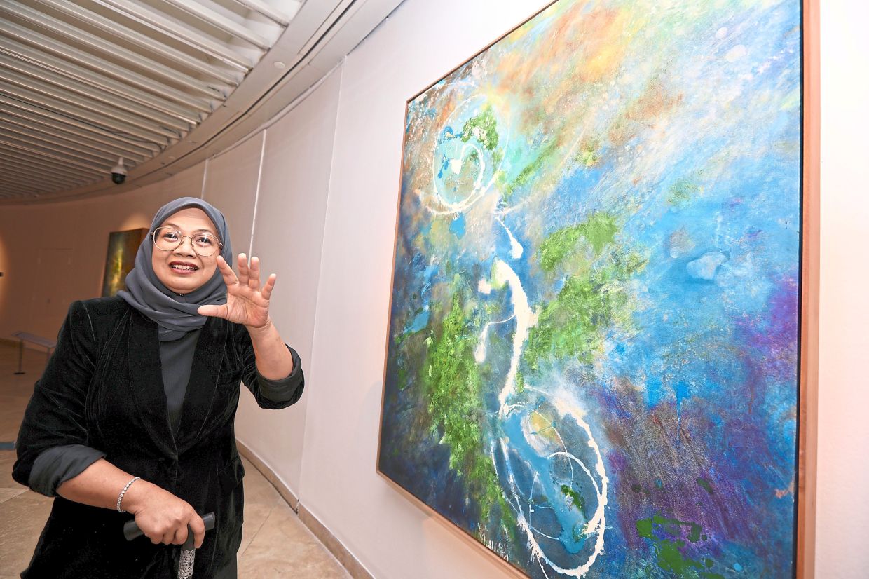 Lyne says her abstract works explore inner space, energy and intuition, reflecting her journey between nanotechnology and visual art. Photo: The Star/Low Lay Phon