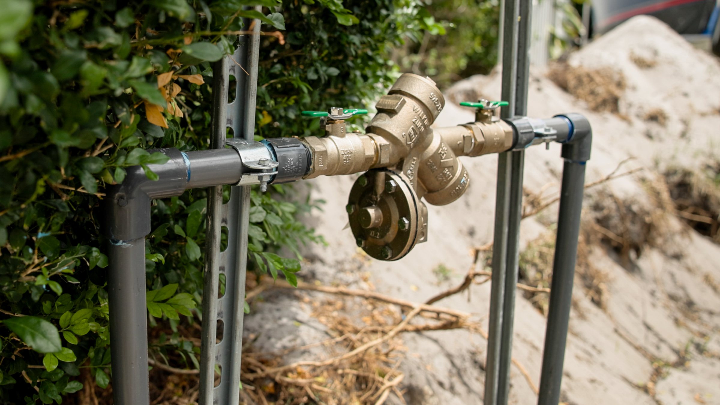 Brass backflow preventer on a water line