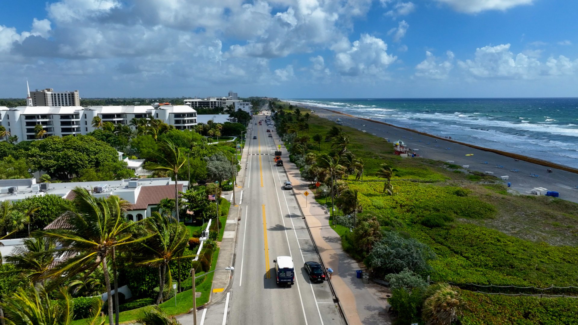 Aerial view of a coastal road beside the ocean