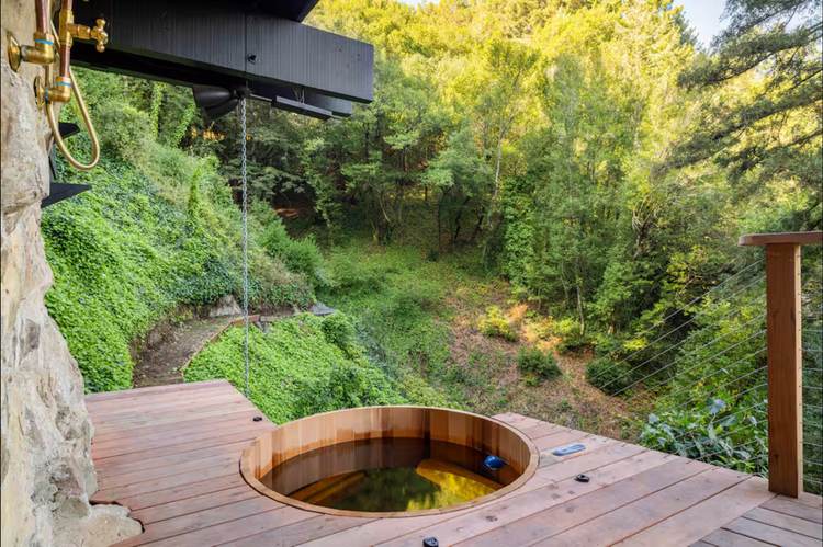 Between Two Creeks treehouse — arched stone entry door, Mill Valley Marin County CA