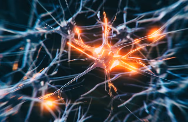 Illustration of interconnected neurons transmitting electrical signals, representing brain activity and neural communication