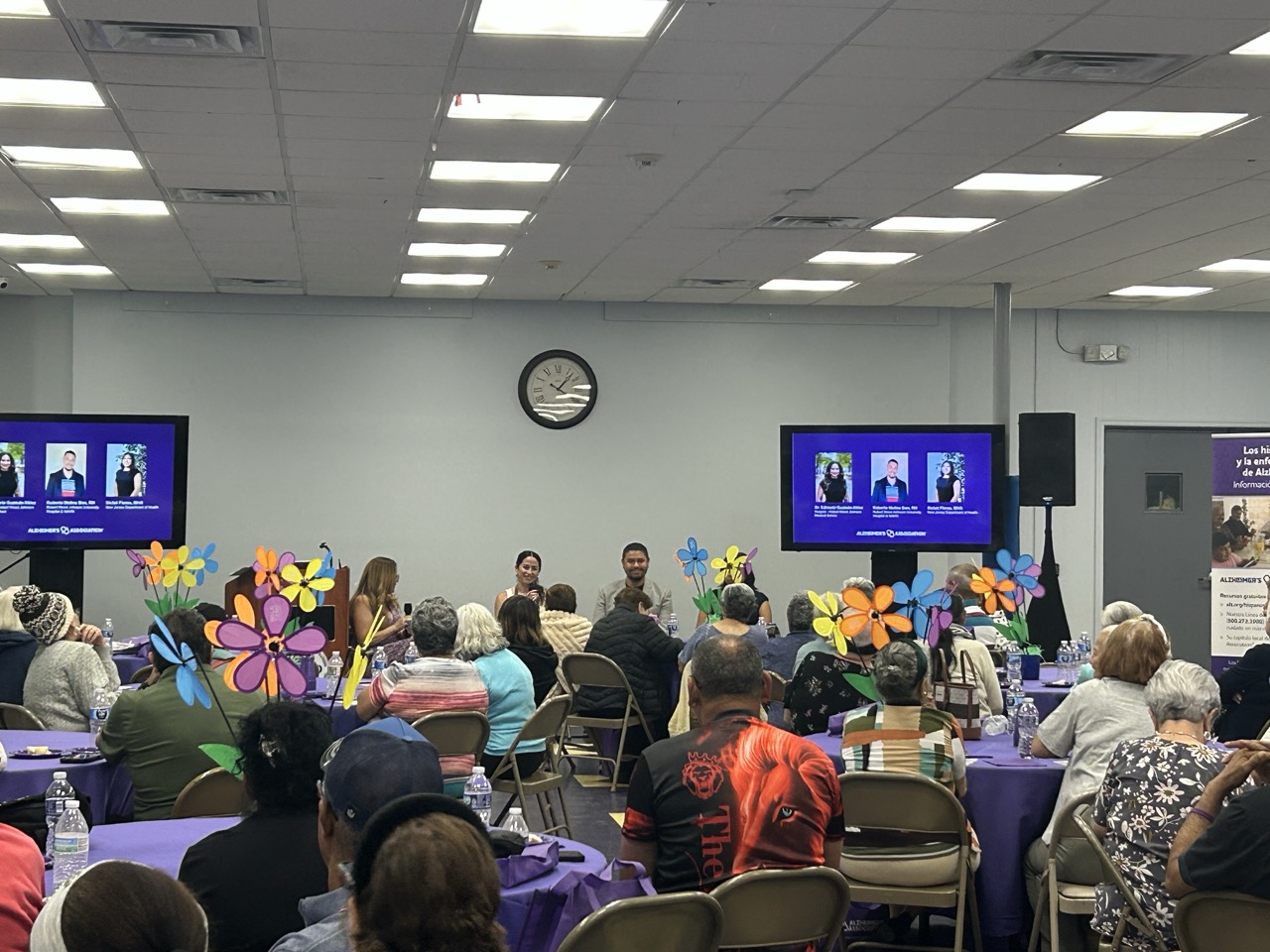 Audience attending an Alzheimer's Association community education event featuring a panel discussion on brain health and dementia
