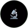 A blue microscope icon on a black circular background with a subtle green border.