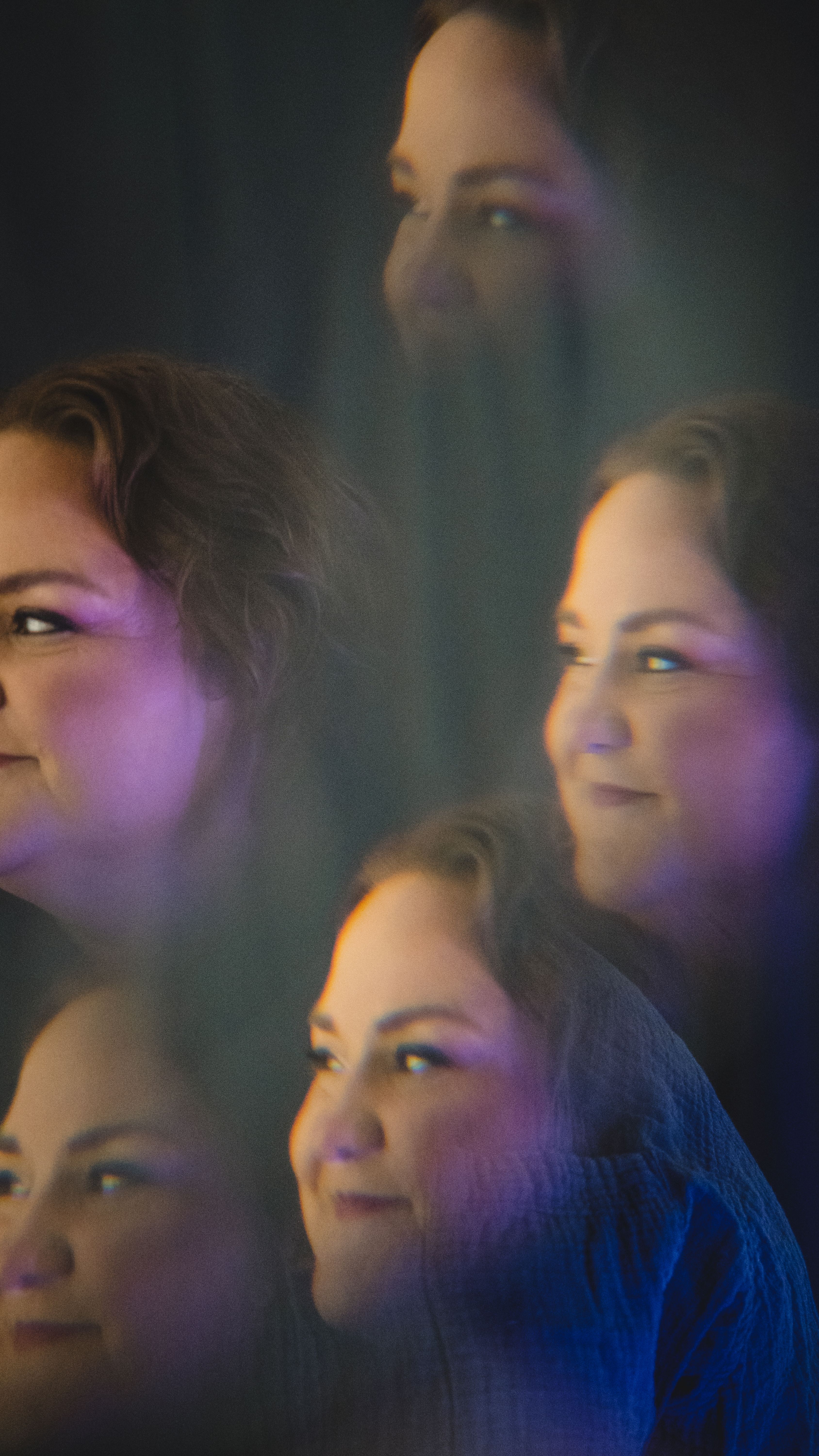 Brandi Zapchenk reflected through prism glass, looking toward the checklist