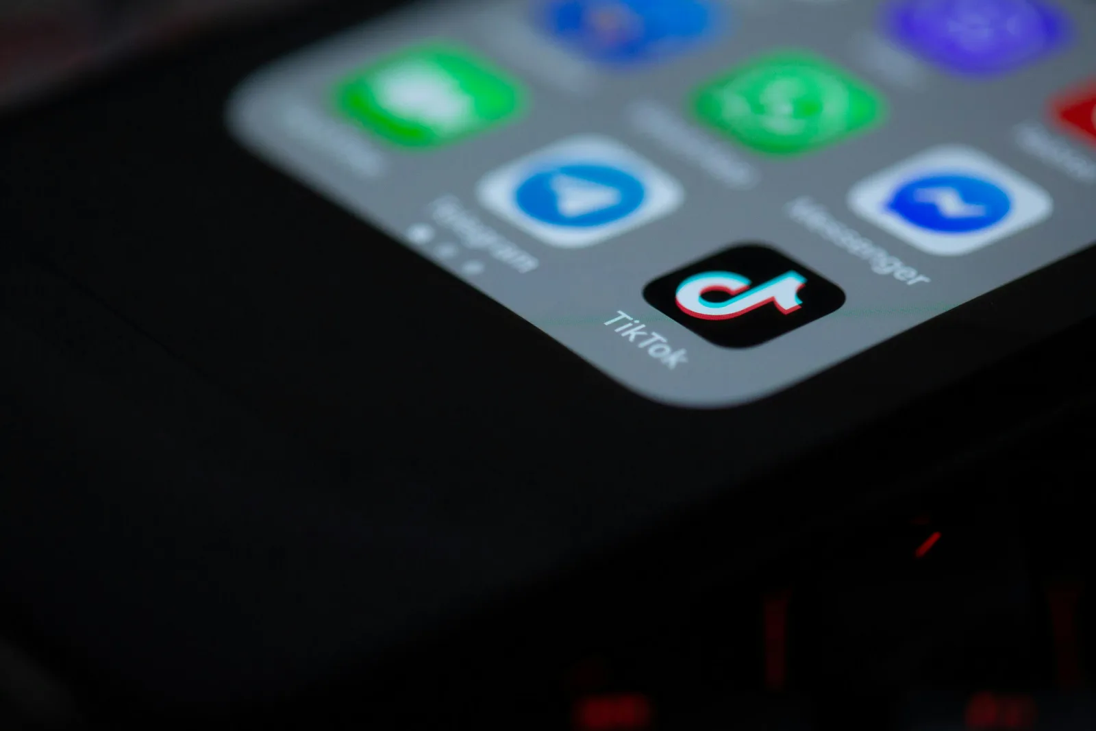 Close-up of social media and messaging app icons on a smartphone screen