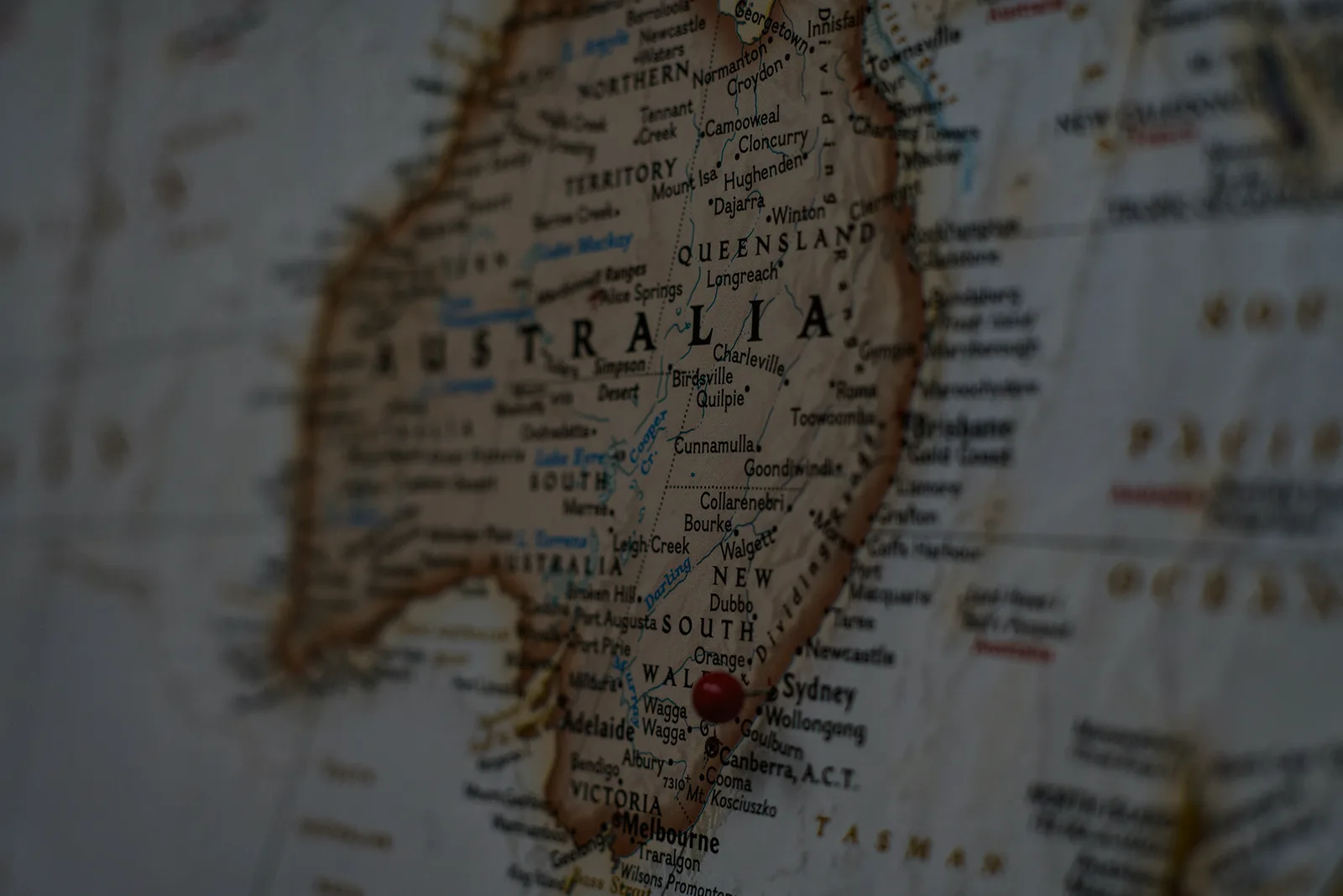 Vintage-style map of Australia marked with a red location pin