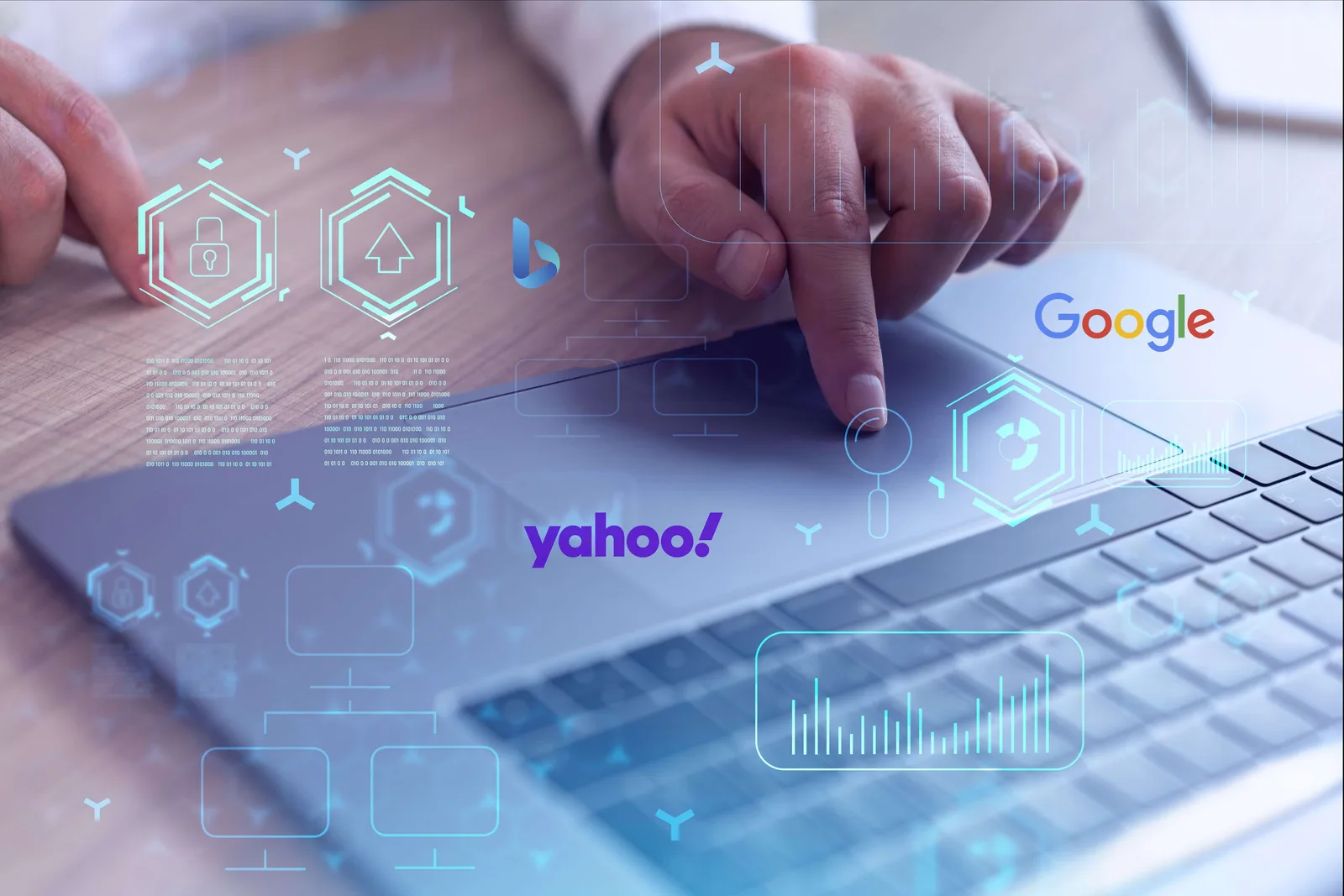 Hands using a laptop with Google and Yahoo logos and search analytics graphics overlaid