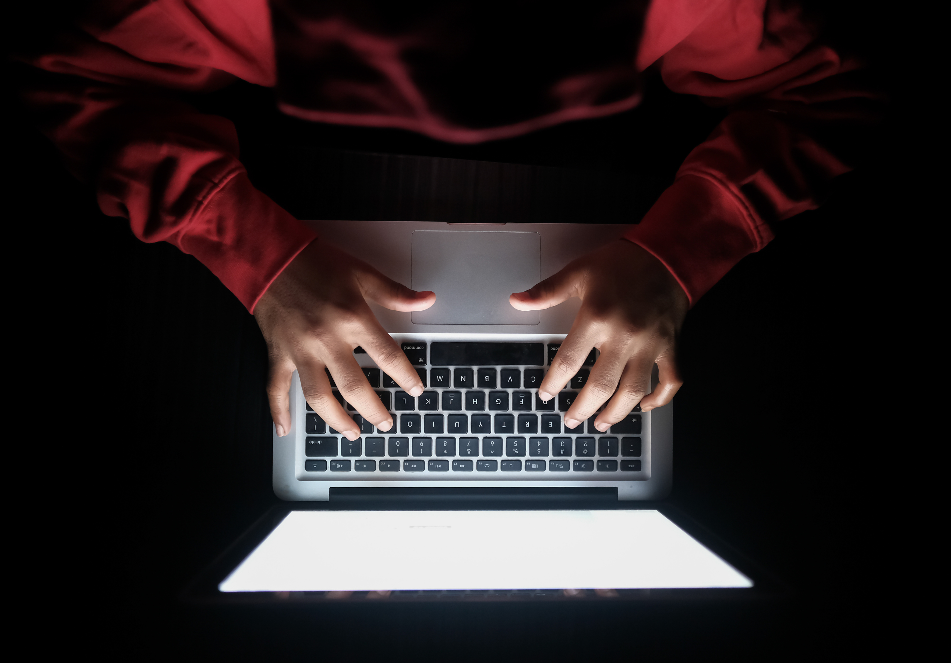 CloudTorque_hacker_using_laptop