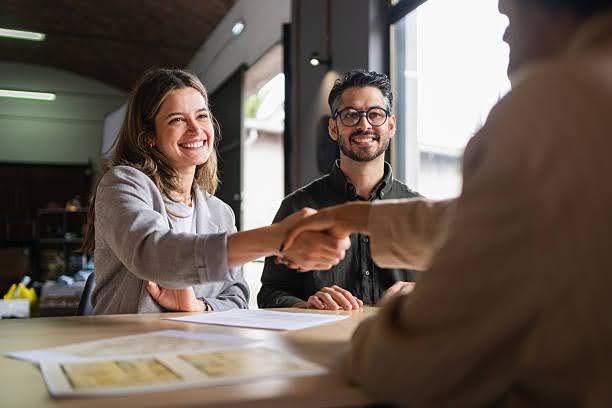 Business owner meeting with a commercial cleaning company representative