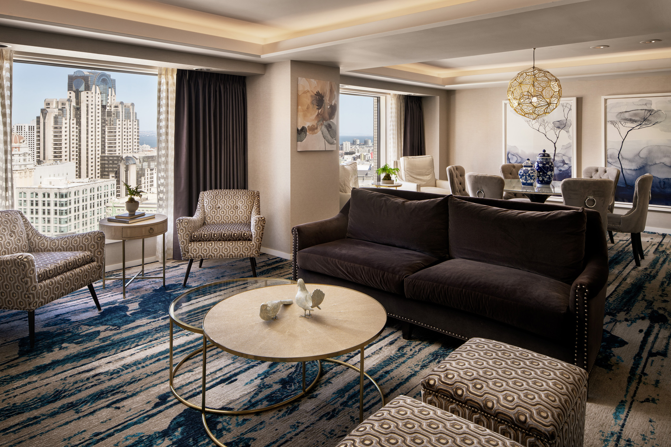 Spacious executive suite with living and dining areas.
