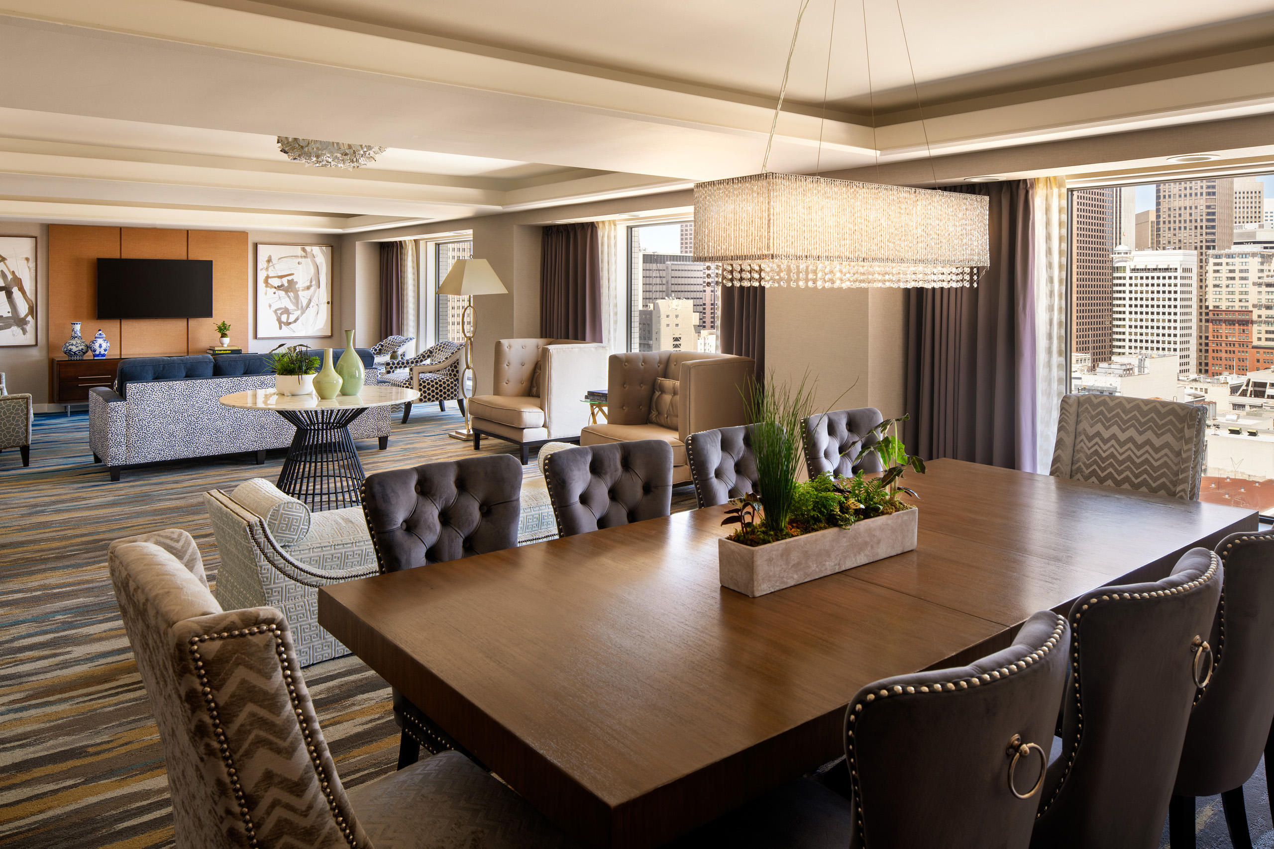 Imperial suite overview with dining area and living room.