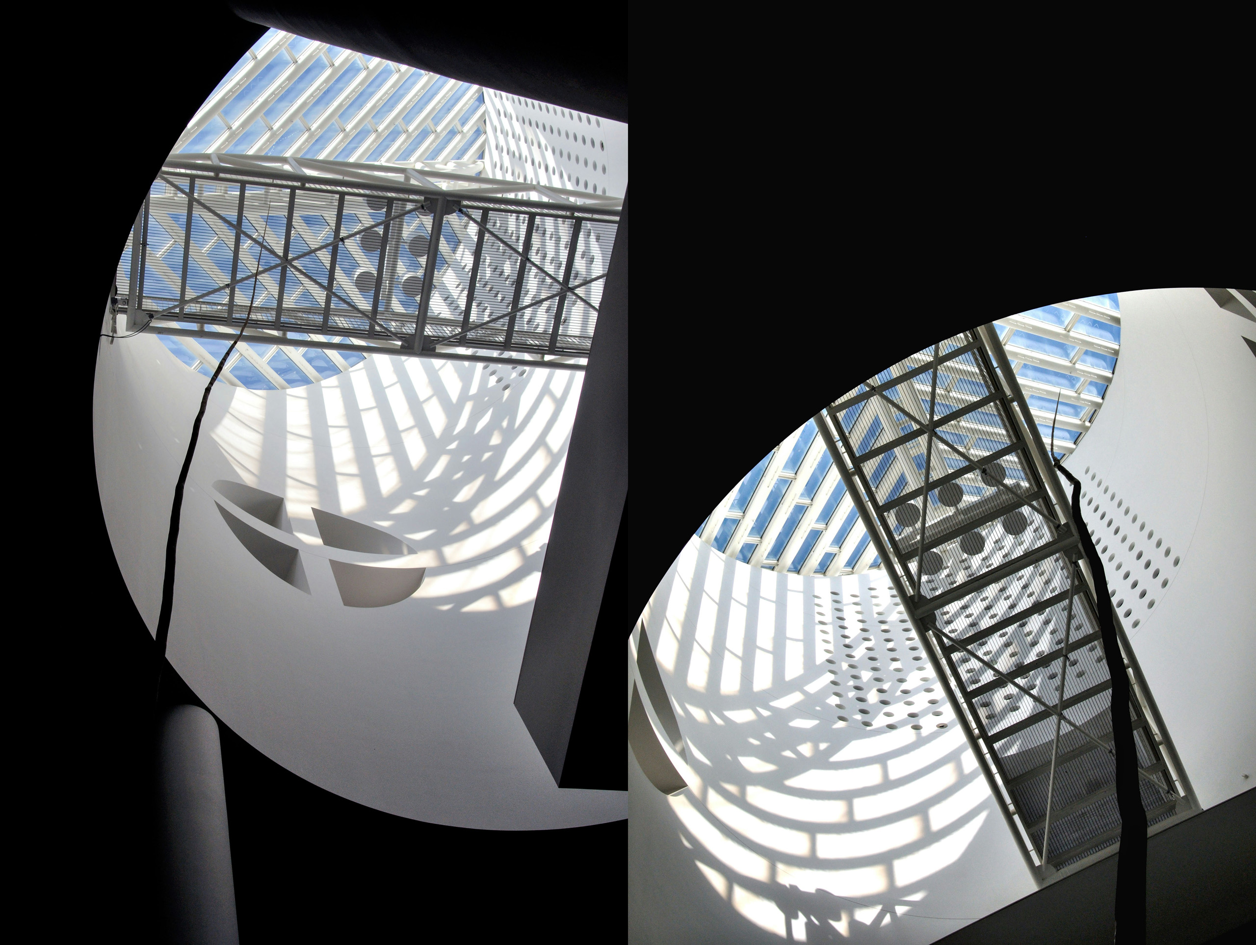 Modern museum interior with skylights and geometric shadows.