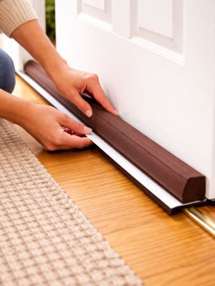 Fitting a draught excluder seal along the bottom of an internal door