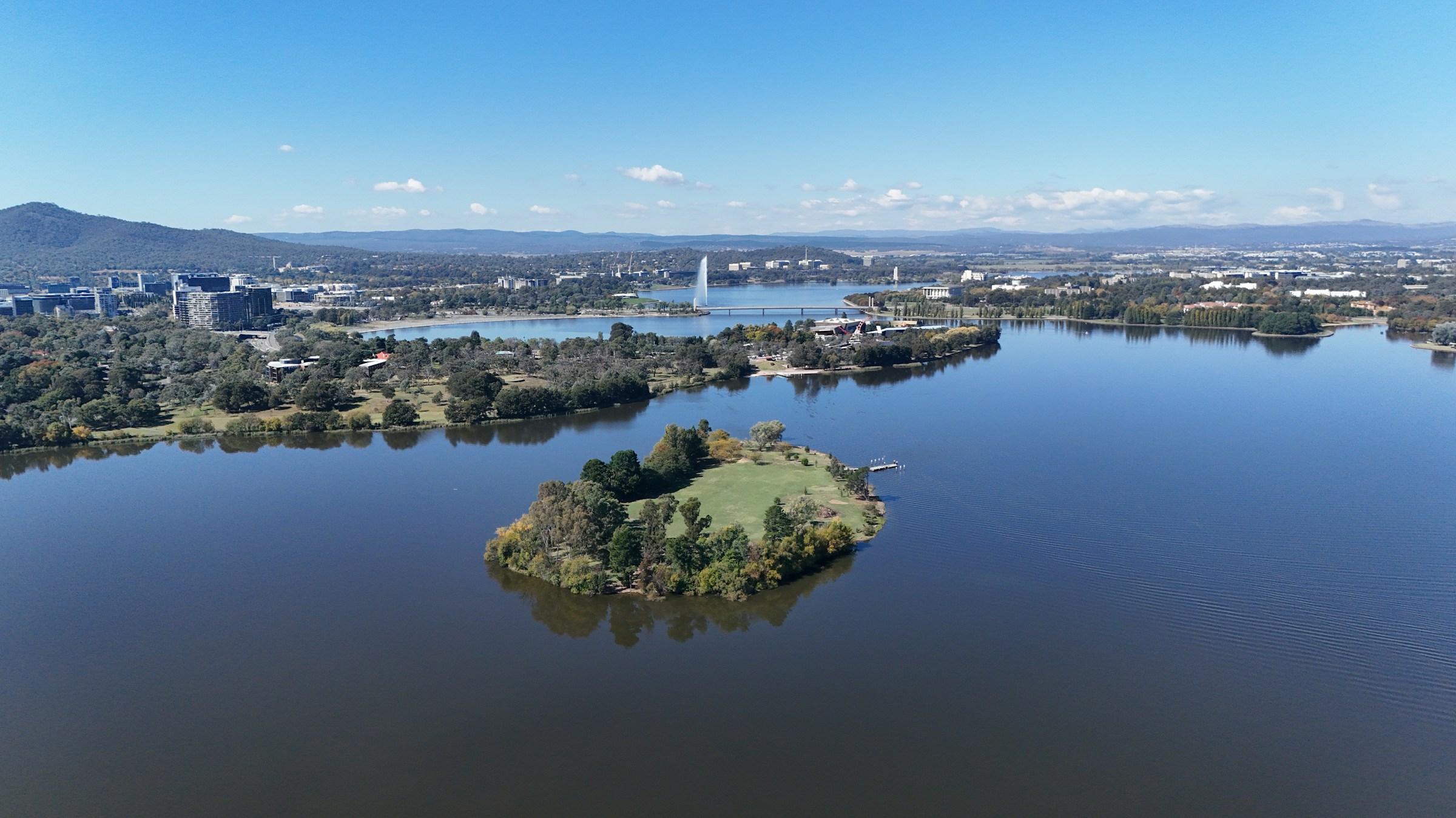 Aerial view of Lake Burley Griffin and central Canberra with the Captain Cook water jet