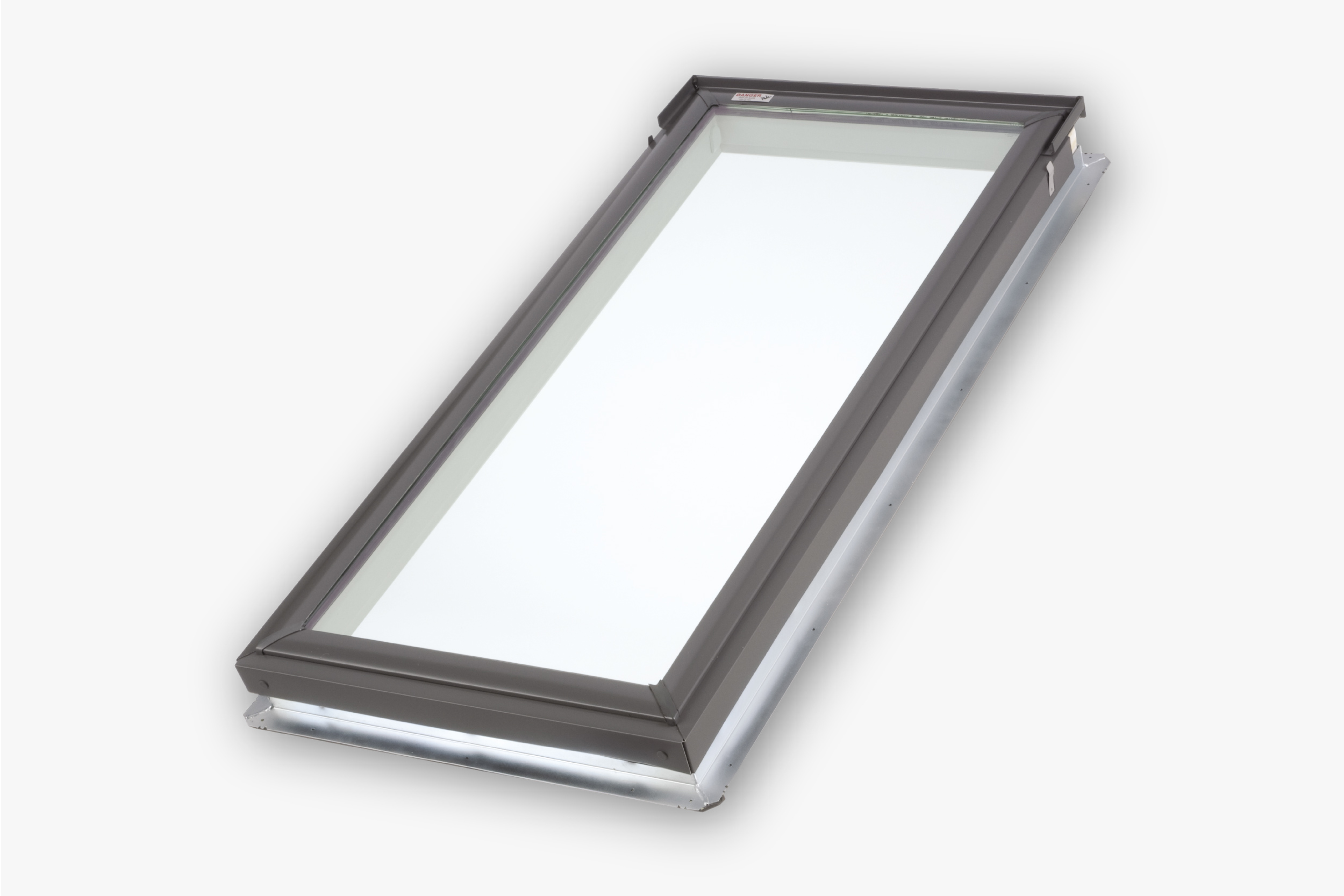 Fixed skylight unit with a bronze frame and metal roof flashing, shown at an angle