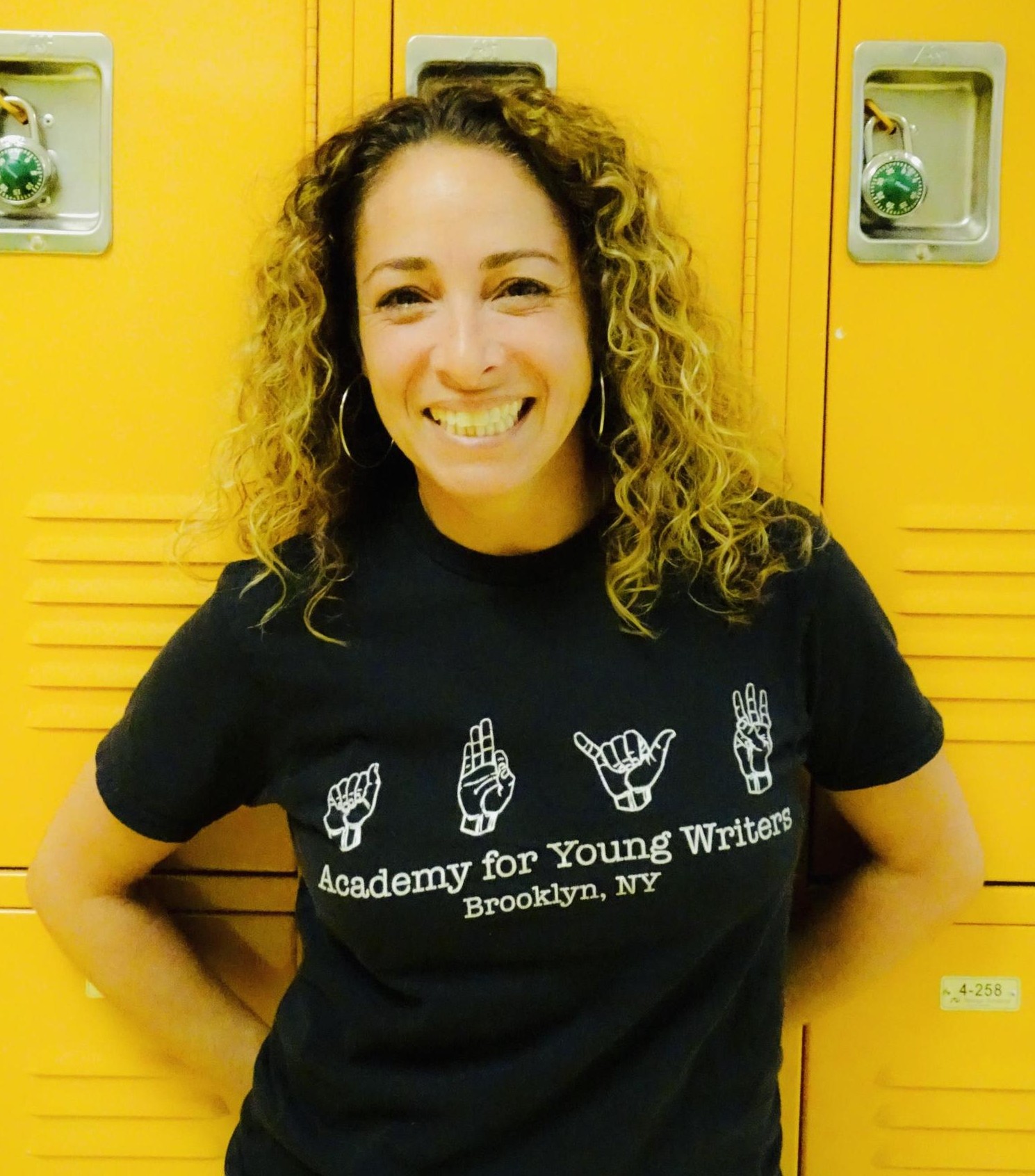 Tamara Boyiatzis wearing Academy for Young Writers Brooklyn shirt