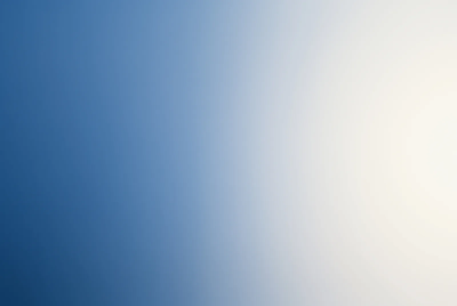A soft gradient moving from deep blue through to warm cream, New Beach journal
