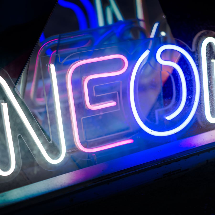 Illuminated neon sign reading NEON — Rick Signs neon sign repair and restoration in Chicago