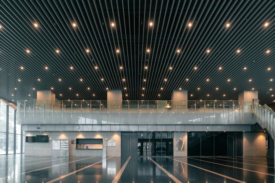 Commercial lobby with extensive ceiling downlighting — interior lighting maintenance for Chicago property managers
