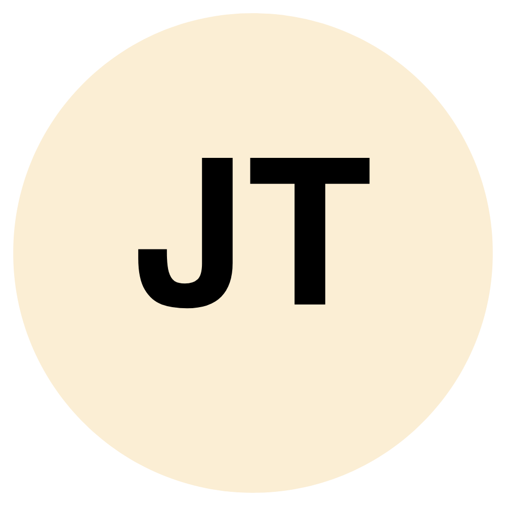A beige circle with the bold black letters 'JT' centered inside it.