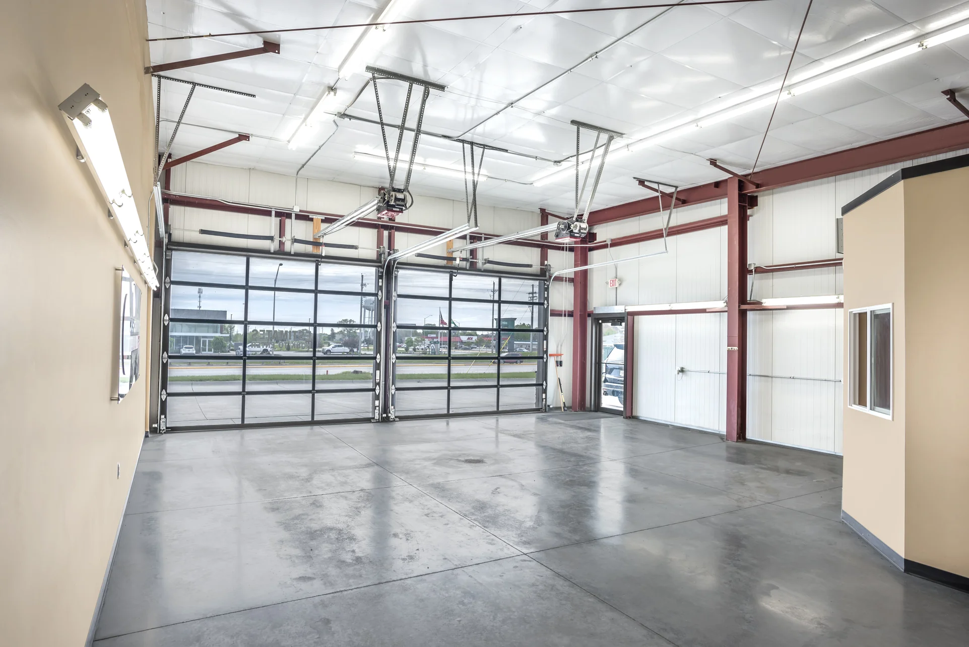 Drive-in bay interior at the Crash Champions collision repair facility