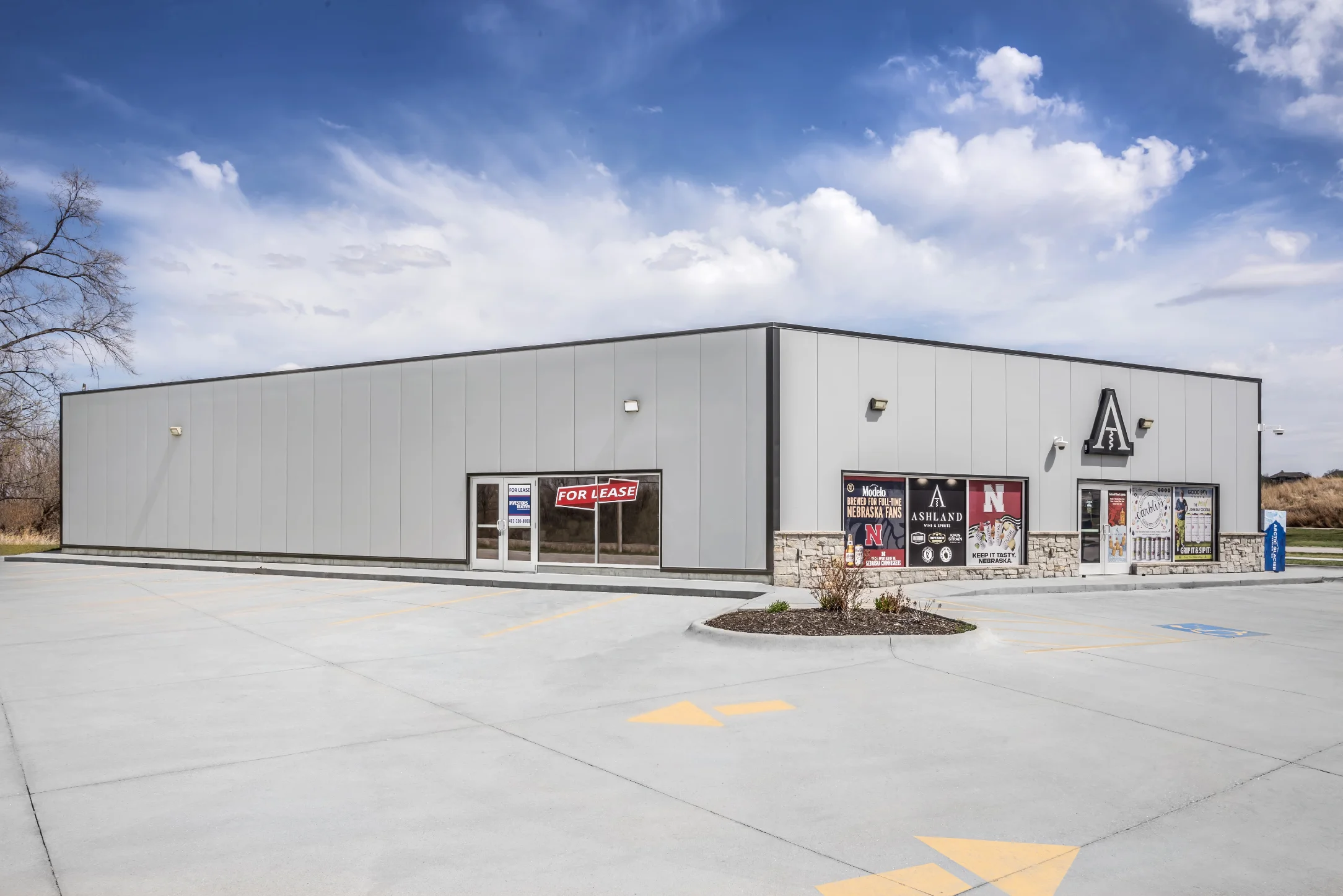 Wide exterior view of the Ashland Wine & Spirits retail building