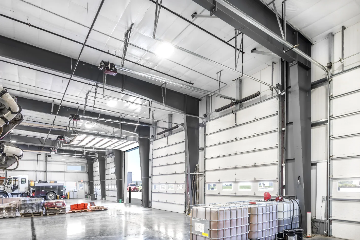 Large industrial workspace interior at the Upton Construction facility