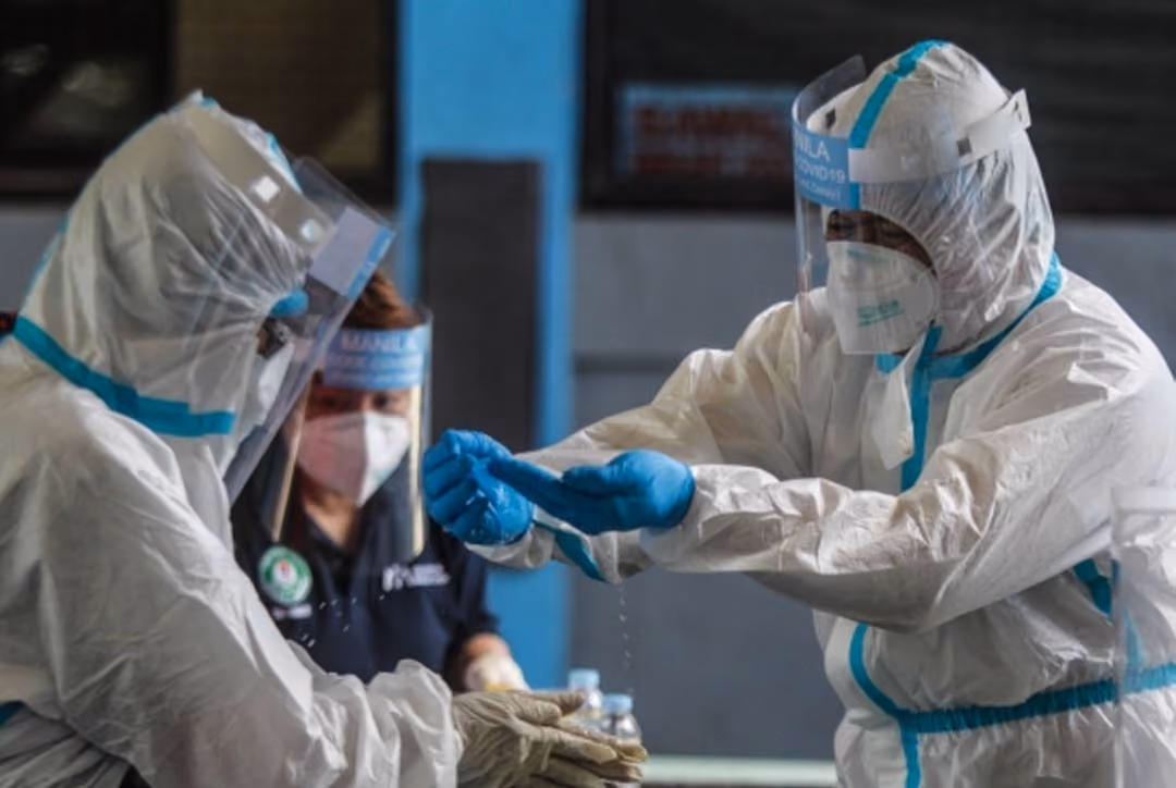 Healthcare workers in personal protective equipment